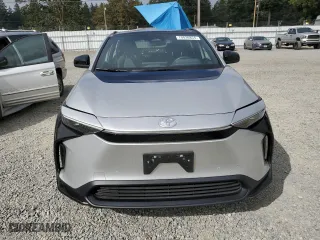 2023 Toyota bZ4X XLE with VIN JTMABACAXPA015022, listed as a Copart auction lot 70030854 with 12,103 mi miles and Salvage Title. Bid and sale history available at carsss.com. Image 5.