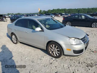 2010 Volkswagen Jetta SE with VIN 3VWRX7AJ1AM048637, listed as a Copart auction lot 57045965 with 158,297 mi miles and Salvage title. Bid and sale history available at DreamBid. Image 4.