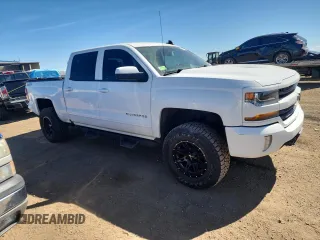 2016 Chevrolet Silverado 1500 LT with VIN 3GCUKREC7GG315533, listed as a Copart auction lot 50883675 with 156,035 mi miles and Salvage Title. Bid and sale history available at DreamBid. Image 4.