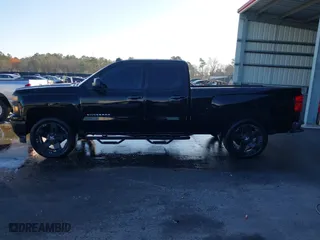2014 Chevrolet Silverado 1500 LT with VIN 1GCRCREC5EZ400824, listed as a IAAI auction lot 41658622 with 107,105 mi miles. Bid and sale history available at carsss.com. Image 14.