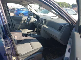 2005 Jeep Grand Cherokee Laredo with VIN 1J4HR48N45C605543, listed as a IAAI auction lot 42612473 with 158,456 mi miles and . Bid and sale history available at DreamBid. Image 5.