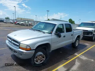 2001 Dodge Dakota with VIN 1B7GG2AX51S167476, listed as a IAAI auction lot 42487594 with 234,228 mi miles and . Bid and sale history available at DreamBid. Image 2.