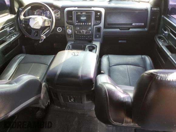 2018 Ram 1500 Rebel z VIN 1C6RR7YT1JS161619, wystawiony jako Copart lot #58272215 z przebiegiem 49 567 mil mil oraz Szkoda całkowita • Salvage title. Historia ofert i sprzedaży dostępna na DreamBid. Obrazek 8.