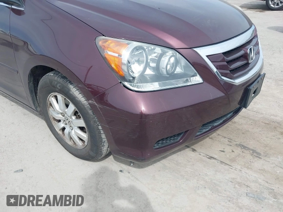 2008 Honda Odyssey EX-L with VIN 5FNRL38748B402957, listed as a IAAI auction lot 42092761 with 142,927 mi miles. Bid and sale history available at carsss.com. Image 6.