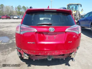 2016 Toyota RAV4 XLE with VIN JTMWFREV6GJ099056, listed as a IAAI auction lot 41941541 with 137,154 mi miles. Bid and sale history available at carsss.com. Image 16.