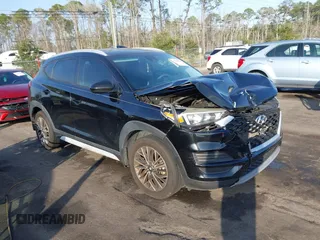 2019 Hyundai Tucson Sport with VIN KM8J33AL9KU878474, listed as a IAAI auction lot 41568959 with 97,412 mi miles. Bid and sale history available at carsss.com. Image 1.