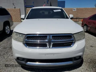 2013 Dodge Durango SXT z VIN 1C4RDHAG5DC673733, wystawiony jako Copart lot #56464215 z przebiegiem 224 075 mil mil oraz Czysty tytuł • Clean title. Historia ofert i sprzedaży dostępna na DreamBid. Obrazek 5.
