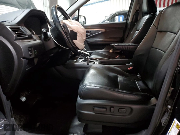 2017 Honda Pilot EX-L with VIN 5FNYF6H55HB096659, listed as a Copart auction lot 60426095 with 144,047 mi miles and Salvage title. Bid and sale history available at DreamBid. Image 7.