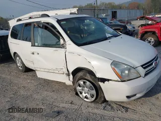 2006 Kia Sedona LX with VIN KNDMB233066087191, listed as a IAAI auction lot 41892132 with 131,674 mi miles. Bid and sale history available at carsss.com. Image 1.