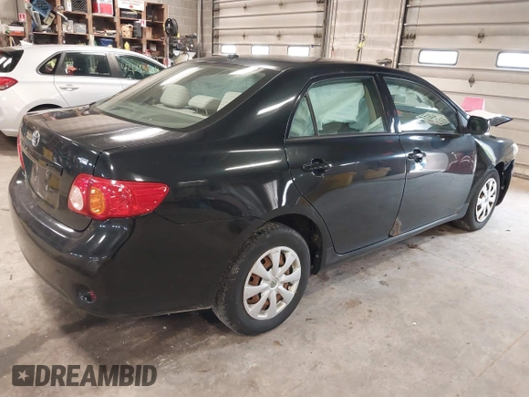 2009 Toyota Corolla with VIN 1NXBU40E29Z133733, listed as a IAAI auction lot 42093904 with 229,509 mi miles. Bid and sale history available at carsss.com. Image 4.