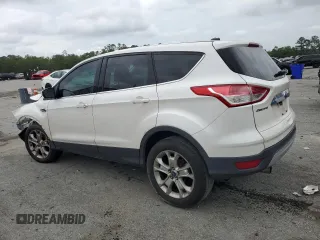 2013 Ford Escape SEL z VIN 1FMCU9HX4DUB05173, wystawiony jako Copart lot #57918125 z przebiegiem 197 195 mil mil oraz Szkoda całkowita • Salvage title. Historia ofert i sprzedaży dostępna na DreamBid. Obrazek 2.