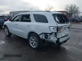 2014 Dodge Durango Citadel with VIN 1C4RDJEG0EC476018, listed as a IAAI auction lot 41212456 with 154,929 mi miles and . Bid and sale history available at DreamBid. Image 3.