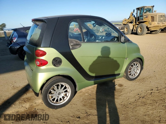 2012 Smart fortwo Pure z VIN WMEEJ3BA7CK543415, wystawiony jako Copart lot #42707385 z przebiegiem 76 280 mil mil oraz Szkody całkowita. Historia ofert i sprzedaży dostępna na DreamBid. Obrazek 3.
