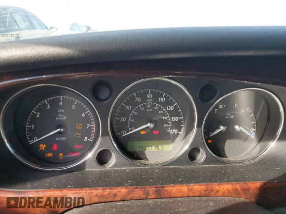 2008 Jaguar XJ with VIN SAJWA71B18SH25255, listed as a Copart auction lot 74781714 with 31,233 mi miles and Salvage Title. Bid and sale history available at carsss.com. Image 9.