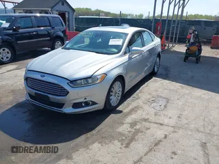 2016 Ford Fusion Energi SE Luxury with VIN 3FA6P0PU8GR273122, listed as a IAAI auction lot 42062083 with 166,318 mi miles. Bid and sale history available at carsss.com. Image 17.