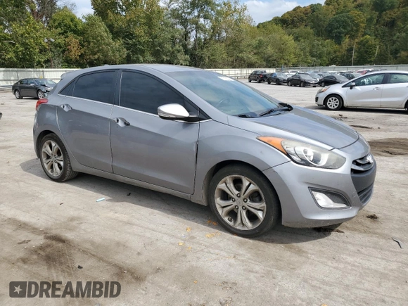 2014 Hyundai Elantra GT with VIN KMHD35LH8EU178662, listed as a Copart auction lot 71918544 with 185,126 mi miles and Salvage Title. Bid and sale history available at carsss.com. Image 4.