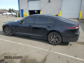 2023 Kia Stinger GT-Line with VIN KNAE35LD7P6125638, listed as a Copart auction lot 50042425 with 57,029 mi miles and Salvage Title. Bid and sale history available at carsss.com. Image 2.