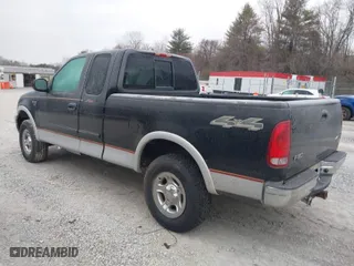 2000 Ford F-150 XL with VIN 1FTRX18L0YNC05663, listed as a IAAI auction lot 41413835 with 1 mi miles. Bid and sale history available at carsss.com. Image 3.