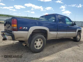 2002 GMC Sierra 1500 SLE with VIN 2GTEK19T621378897, listed as a Copart auction lot 60898315 with 137,509 mi miles and Salvage title. Bid and sale history available at DreamBid. Image 3.