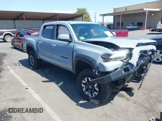 2019 Toyota Tacoma SR with VIN 3TMCZ5AN7KM247008, listed as a IAAI auction lot 42283045 with 51,152 mi miles and . Bid and sale history available at DreamBid. Image 1.