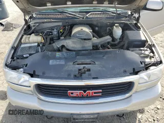 2005 GMC Yukon XL SLT z VIN 1GKFK16Z25J170446, wystawiony jako Copart lot #60833165 z przebiegiem 255 497 mil mil oraz Czysty tytuł • Clean title. Historia ofert i sprzedaży dostępna na DreamBid. Obrazek 12.