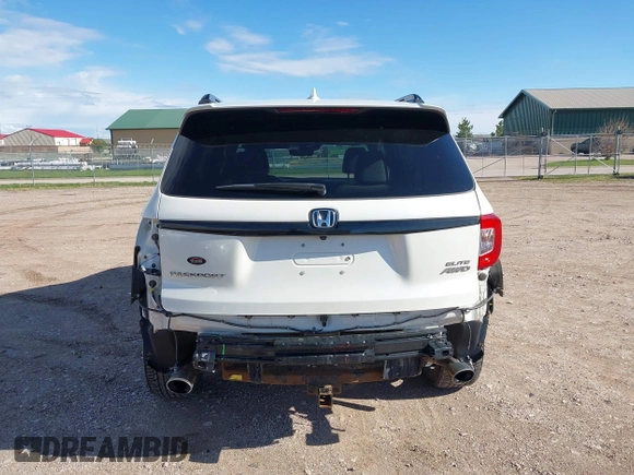 2019 Honda Passport Elite z VIN 5FNYF8H0XKB001472, wystawiony jako IAAI lot #42143890 z przebiegiem 98 119 mil mil oraz . Historia ofert i sprzedaży dostępna na DreamBid. Obrazek 17.
