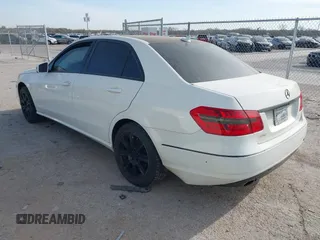 2012 Mercedes-Benz E-Class E 350 Luxury with VIN WDDHF8JBXCA595315, listed as a IAAI auction lot 41871462 with 122,677 mi miles. Bid and sale history available at carsss.com. Image 3.