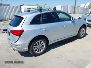 2014 Audi Q5 Premium Plus with VIN WA1LFAFP2EA004004, listed as a IAAI auction lot 42674248 with 185,559 mi miles and . Bid and sale history available at DreamBid. Image 4.