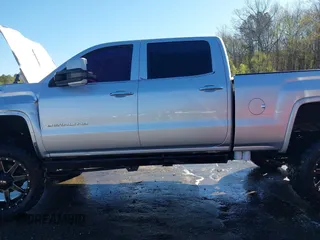2015 GMC Sierra 2500HD available WiFi Denali with VIN 1GT120E87FF173940, listed as a IAAI auction lot 41843586 with 167,992 mi miles. Bid and sale history available at carsss.com. Image 15.