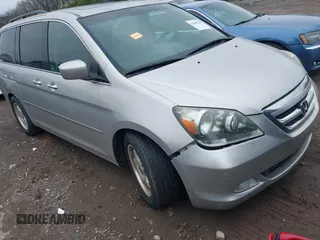 2007 Honda Odyssey Touring with VIN 5FNRL38857B067926, listed as a IAAI auction lot 41903218 with 256,676 mi miles. Bid and sale history available at carsss.com. Image 1.
