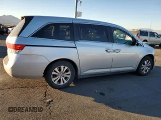 2015 Honda Odyssey EX-L with VIN 5FNRL5H69FB077433, listed as a Copart auction lot 88999285 with 193,926 mi miles and Salvage Title. Bid and sale history available at DreamBid. Image 3.