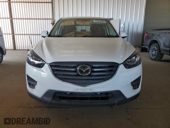 2016 Mazda CX-5 Touring with VIN JM3KE2CY7G0900533, listed as a Copart auction lot 47644565 with 132,689 mi miles and Salvage Title. Bid and sale history available at carsss.com. Image 5.