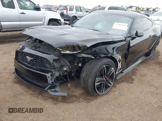 2015 Ford Mustang EcoBoost z VIN 1FA6P8TH6F5370313, wystawiony jako IAAI lot #42206594 z przebiegiem 76 769 mil mil oraz . Historia ofert i sprzedaży dostępna na DreamBid. Obrazek 6.