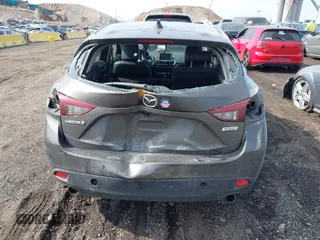 2014 Mazda 3 i Grand Touring with VIN JM1BM1M75E1207754, listed as a IAAI auction lot 41698583 with 128,887 mi miles and . Bid and sale history available at DreamBid. Image 6.