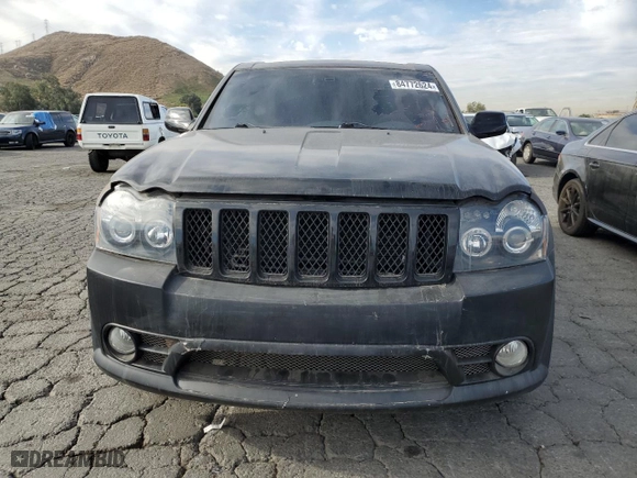 2007 Jeep Grand Cherokee SRT-8 with VIN 1J8HR78357C502665, listed as a Copart auction lot 84772624 with 153,311 mi miles and Clean Title. Bid and sale history available at carsss.com. Image 5.