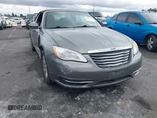 2012 Chrysler 200 Touring with VIN 1C3BCBEB9CN159875, listed as a IAAI auction lot 41523442 with 137,949 mi miles and . Bid and sale history available at carsss.com. Image 1.