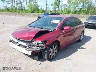 2010 Honda Civic Sdn LX with VIN 2HGFA1F56AH521402, listed as a IAAI auction lot 41981595 with 223,377 mi miles. Bid and sale history available at carsss.com. Image 2.