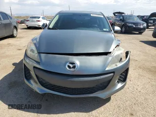2012 Mazda 3 i Touring with VIN JM1BL1L7XC1534992, listed as a Copart auction lot 63142035 with 122,952 mi miles and Salvage title. Bid and sale history available at DreamBid. Image 5.