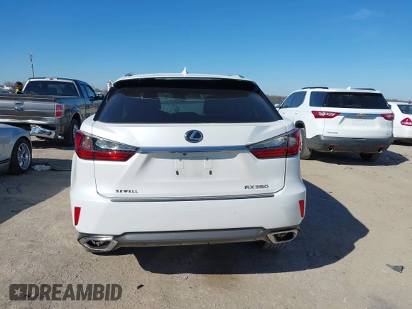 2018 Lexus RX 350 z VIN 2T2ZZMCAXJC106256, wystawiony jako IAAI lot #41658817 z przebiegiem 103 733 mil mil oraz . Historia ofert i sprzedaży dostępna na DreamBid. Obrazek 15.