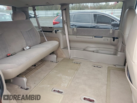2003 GMC Safari z VIN 1GKEL19X63B510272, wystawiony jako Copart lot #75436594 z przebiegiem 31 989 mil mil oraz Szkody całkowita. Historia ofert i sprzedaży dostępna na DreamBid. Obrazek 11.