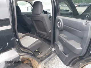 2007 Dodge Nitro SXT z VIN 1D8GU28K97W727361, wystawiony jako IAAI lot #42142970 z przebiegiem 144 579 mil mil oraz . Historia ofert i sprzedaży dostępna na DreamBid. Obrazek 8.