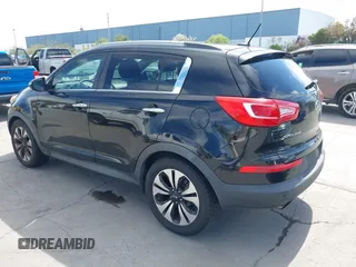 2011 Kia Sportage SX with VIN KNDPC3A69B7149771, listed as a IAAI auction lot 42012102 with 125,157 mi miles and . Bid and sale history available at carsss.com. Image 3.