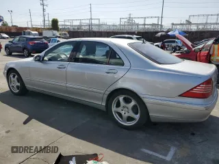2001 Mercedes-Benz S-Class with VIN WDBNG75J81A211002, listed as a Copart auction lot 51296725 with 148,065 mi miles and Salvage Title. Bid and sale history available at carsss.com. Image 2.