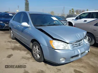 2005 Kia Spectra LX with VIN KNAFE122X55165738, listed as a IAAI auction lot 41669711 with 96,171 mi miles. Bid and sale history available at carsss.com. Image 1.