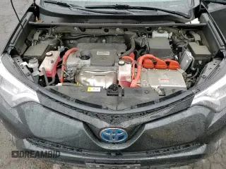 2018 Toyota RAV4 Hybrid SE with VIN JTMJJREV6JD180833, listed as a Copart auction lot 62817765 with 67,003 mi miles and Salvage title. Bid and sale history available at DreamBid. Image 16.