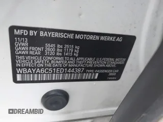 2014 BMW 7 Series 740i with VIN WBAYA6C51ED144387, listed as a IAAI auction lot 41226638 with 161,448 mi miles. Bid and sale history available at carsss.com. Image 9.