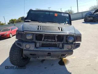 2005 Hummer H2 SUV with VIN 5GRGN23U95H101796, listed as a Copart auction lot 76991574 with 88,204 mi miles and Salvage Title. Bid and sale history available at carsss.com. Image 5.