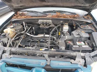 2005 Mazda Tribute i with VIN 4F2YZ02Z85KM19097, listed as a IAAI auction lot 41547466 with 121,709 mi miles and . Bid and sale history available at carsss.com. Image 10.