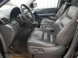 2005 Honda Odyssey EX-L with VIN 5FNRL38785B054186, listed as a Copart auction lot 58072125 with 219,928 mi miles and Salvage title. Bid and sale history available at DreamBid. Image 7.