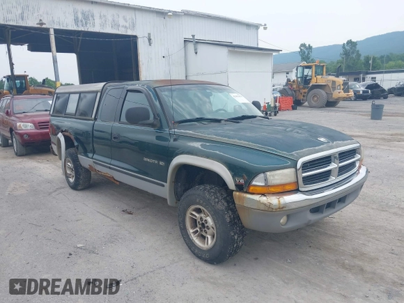 1999 Dodge Dakota SLT z VIN 1B7GG22X0XS104969, wystawiony jako IAAI lot #42493470 z przebiegiem 160 019 mil mil oraz . Historia ofert i sprzedaży dostępna na DreamBid. Obrazek 1.